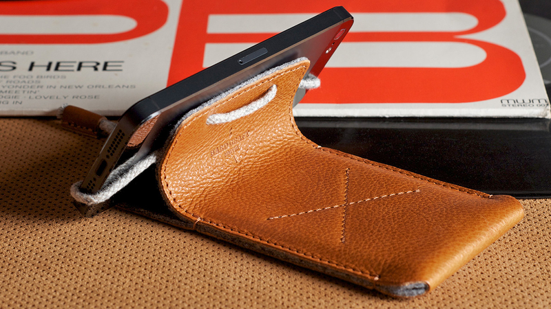 Illustration for article titled A Leather iPhone Sleeve That Does More Than Just Look Good